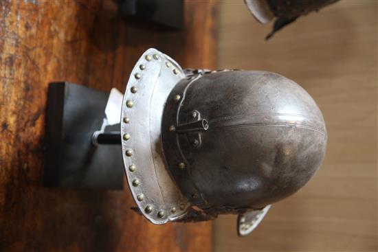 A Cromwellian helmet,
